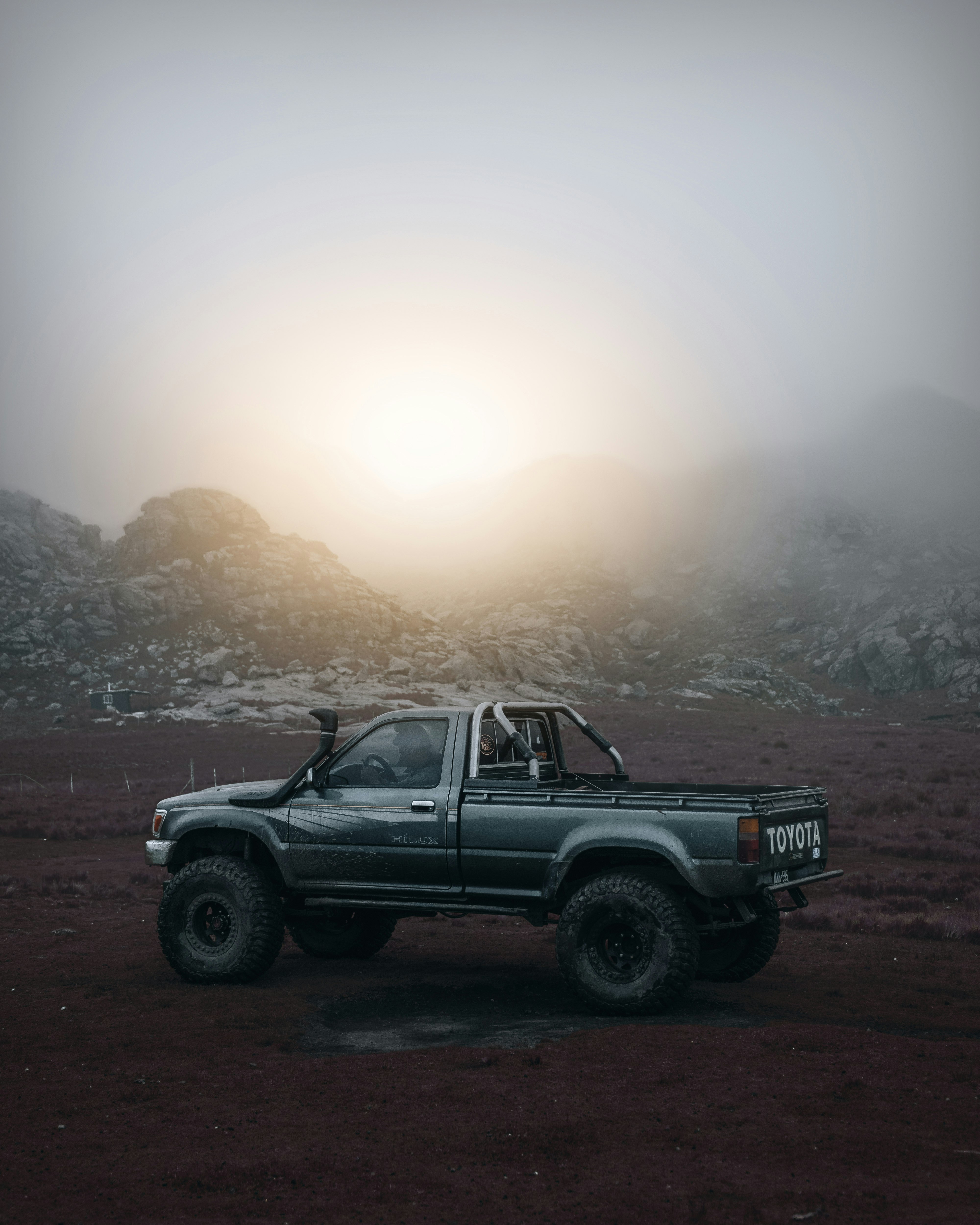 black suv on brown sand during daytime